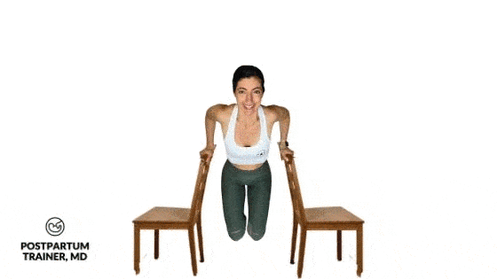 brittany performing dips in between two chairs without the assistance of her feet