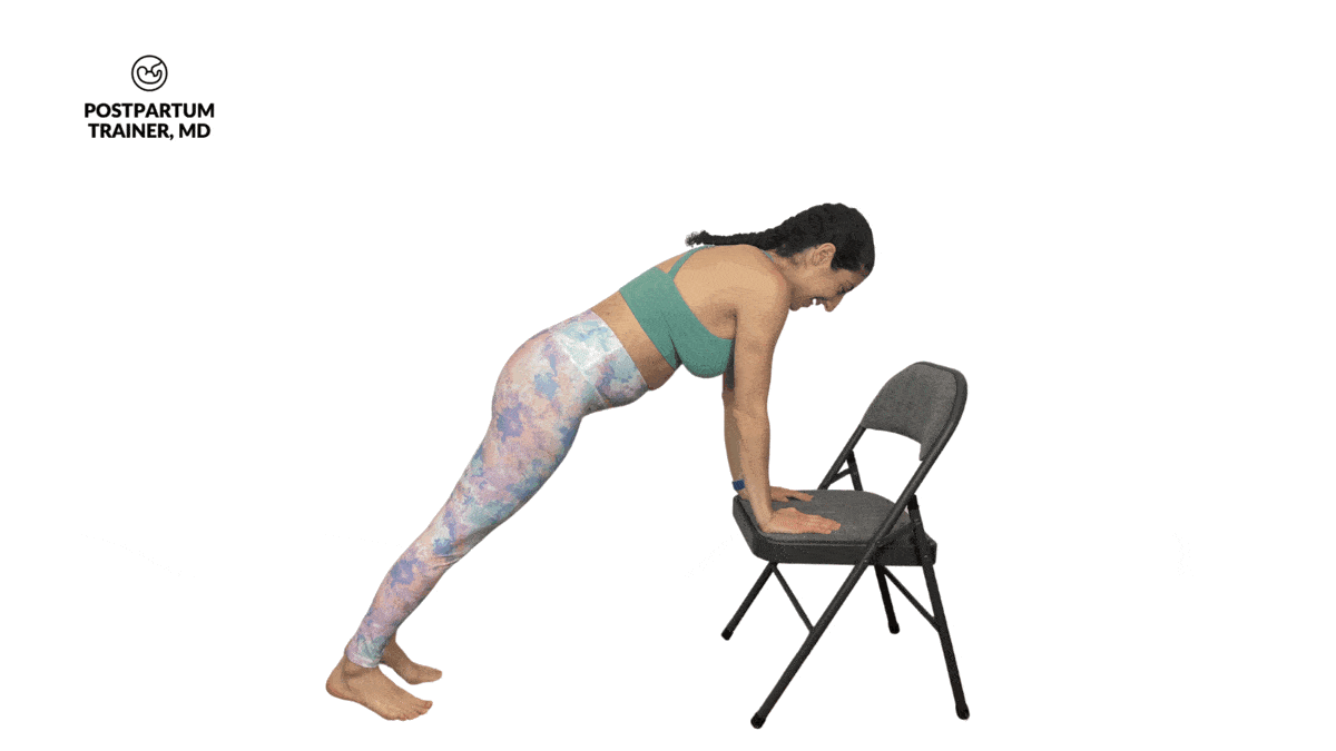 pregnant woman performing incline mountain climbers on a chair