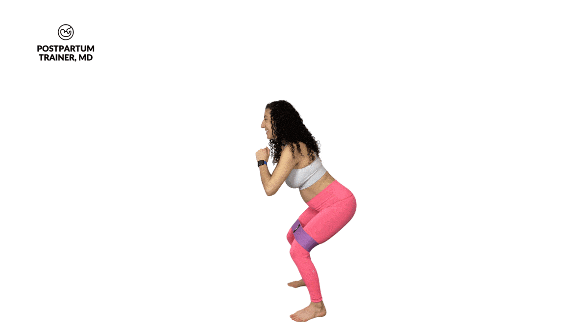 Pregnant woman performing banded lateral walks