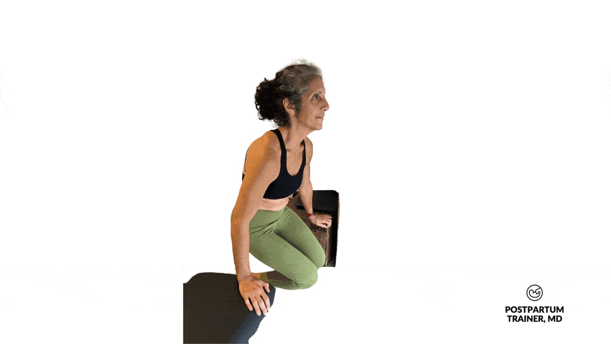 Post menopausal woman doing feet supported dips
