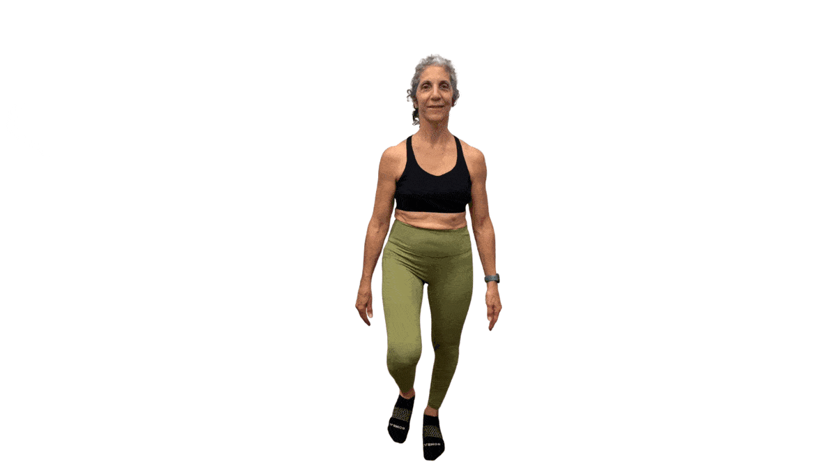 Post menopausal woman doing ankle rolls with right ankle