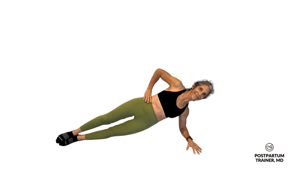 Post menopausal woman doing side plank