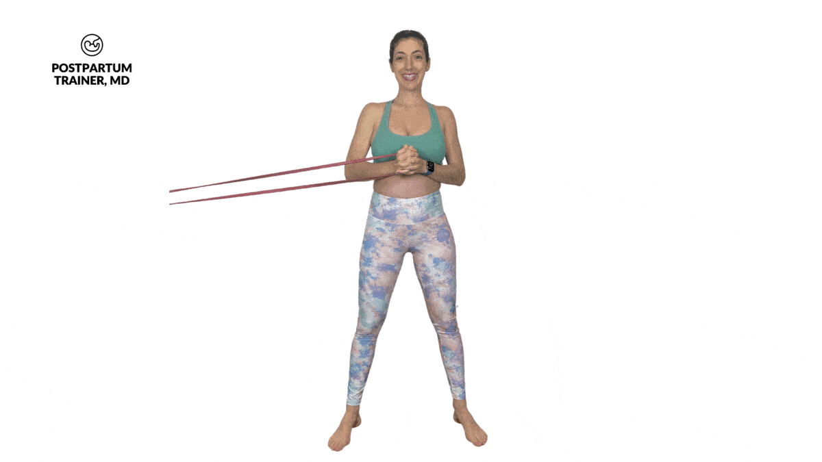 pregnant-woman-performng-standing-pallof-press-with-resistance-band